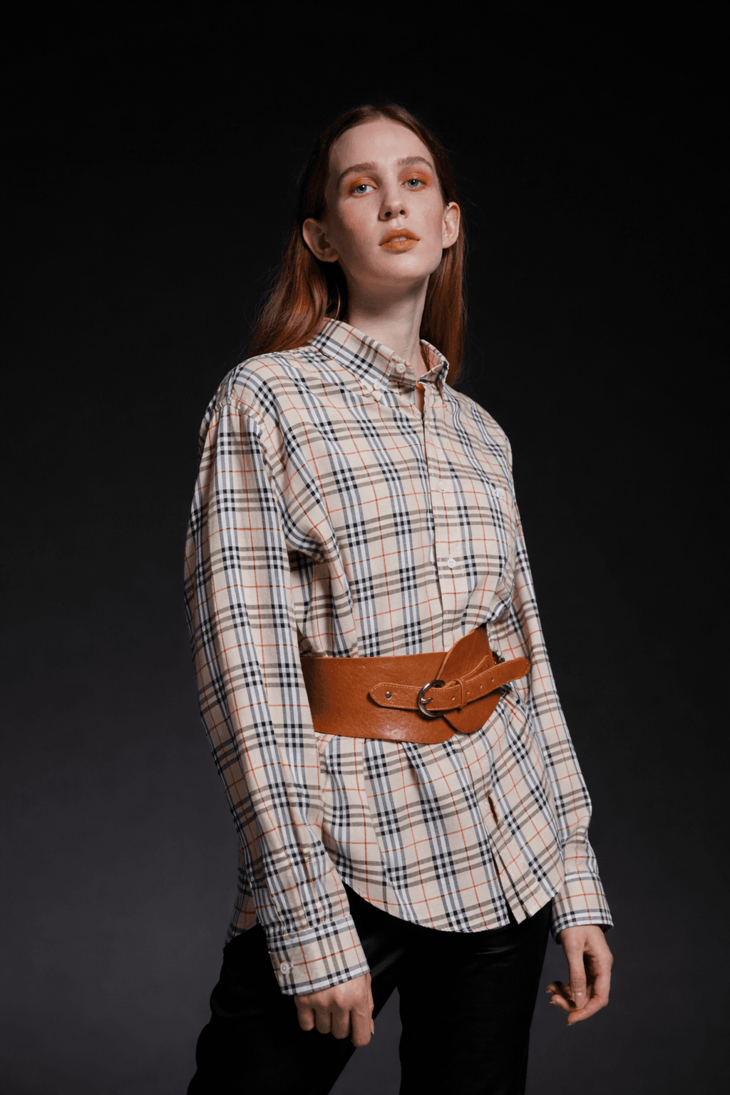 High-contrast editorial portrait backdrop and styling