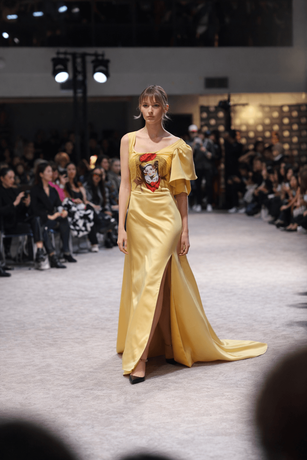 Flowing yellow gown portrait detail