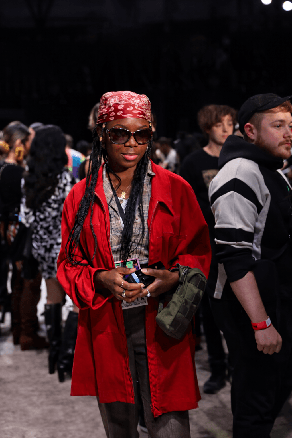 VIP attendee in bold red jacket