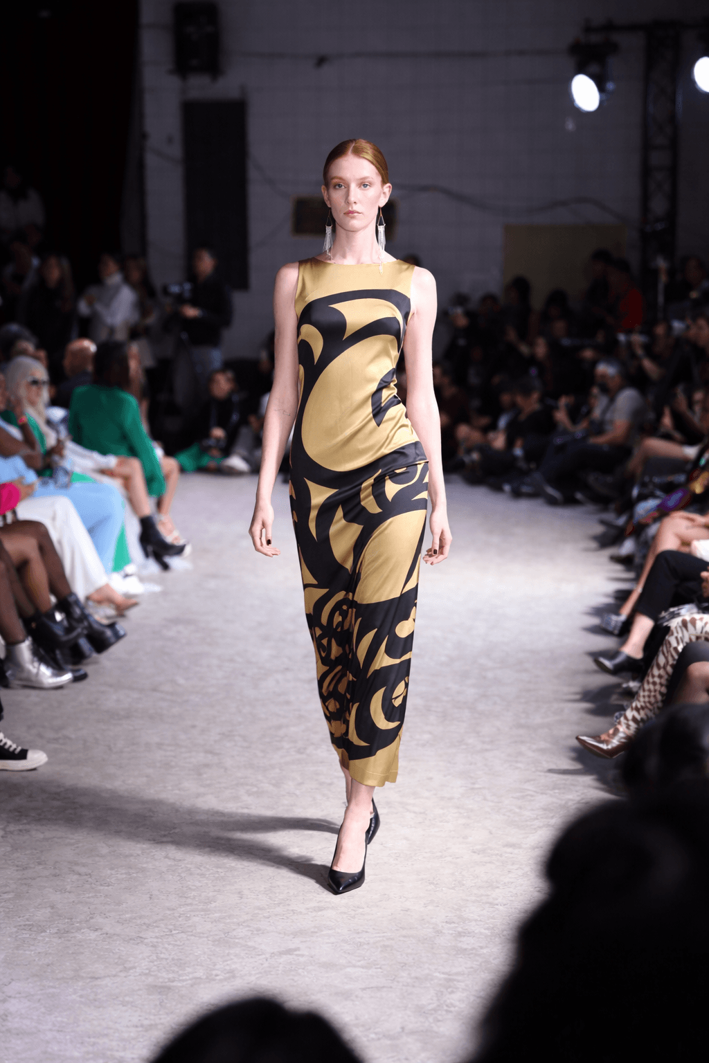 Sheer black top and champagne gold skirt