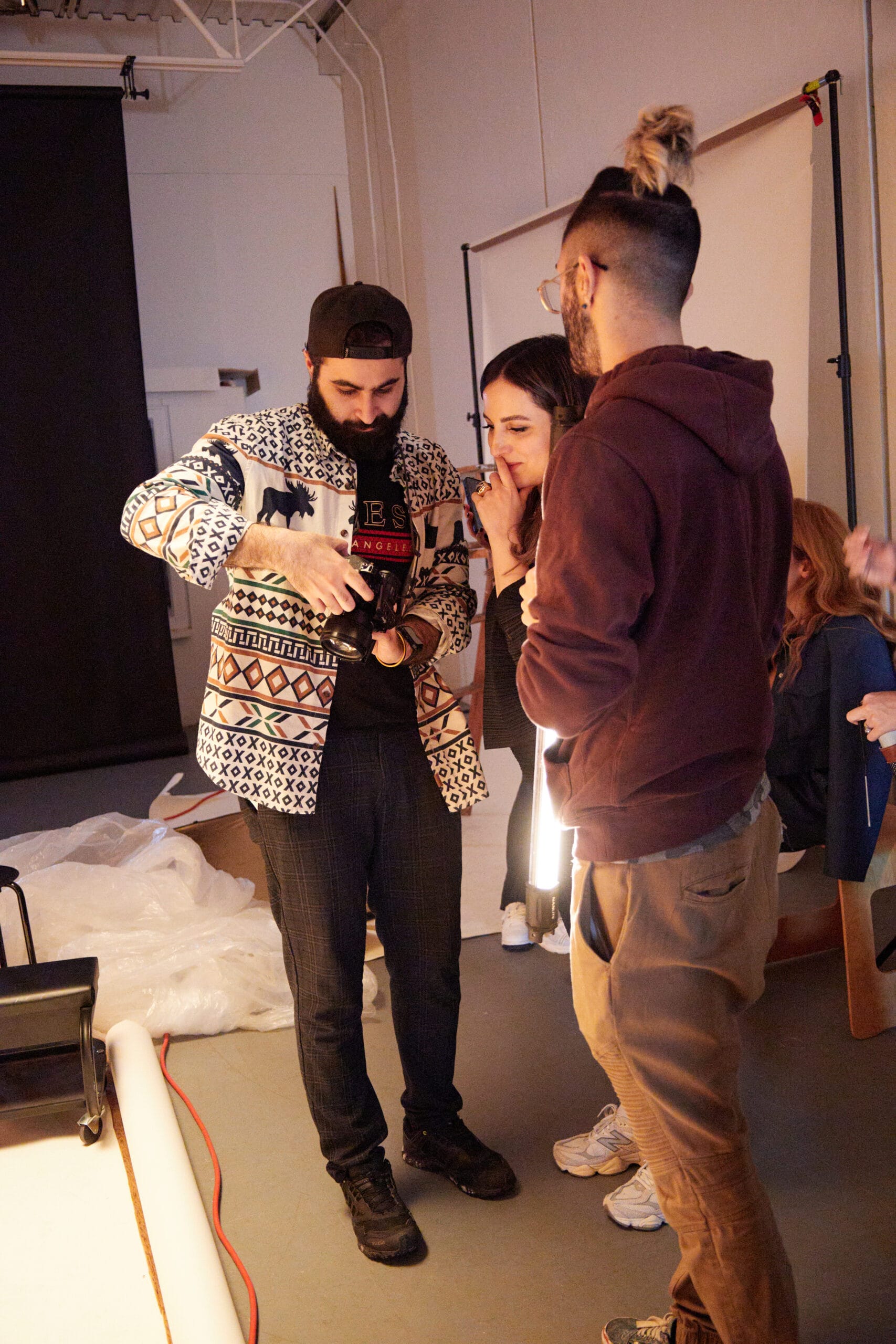 Vancouver commercial photographer analyzing apparel campaign photography on a studio monitor during pre-production