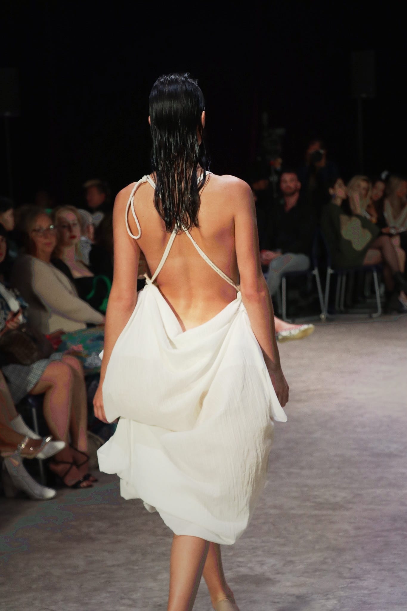 Cinematic runway look featuring a dramatic dark narrative and heavy shadows