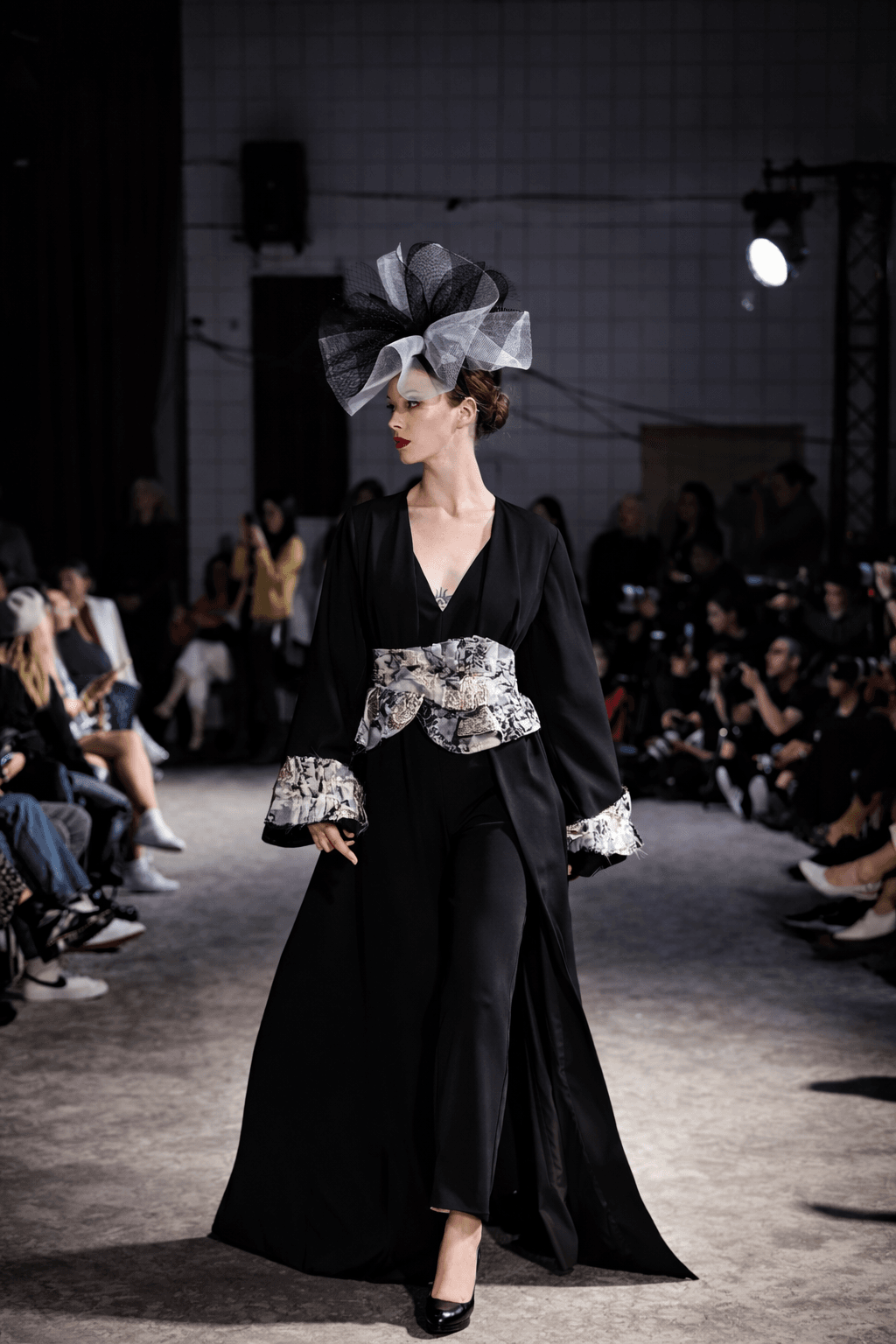 Fashionable guest sitting front row at Vancouver Fashion Week