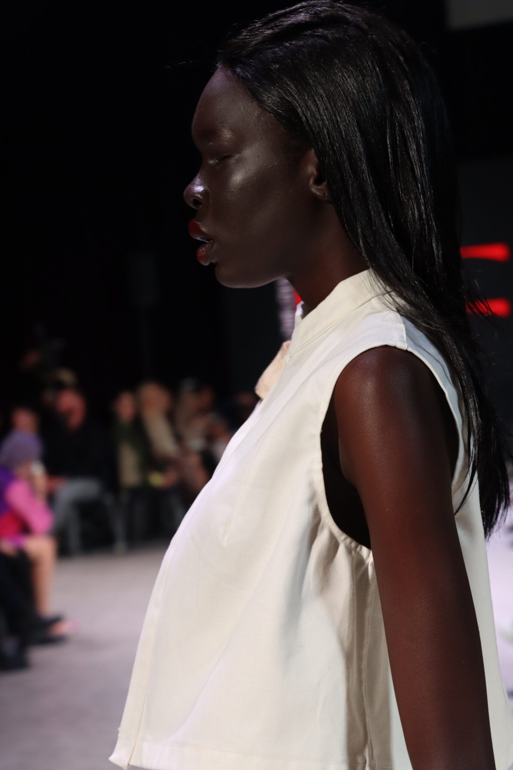 Vibrant color theory displayed on the runway with bold reds